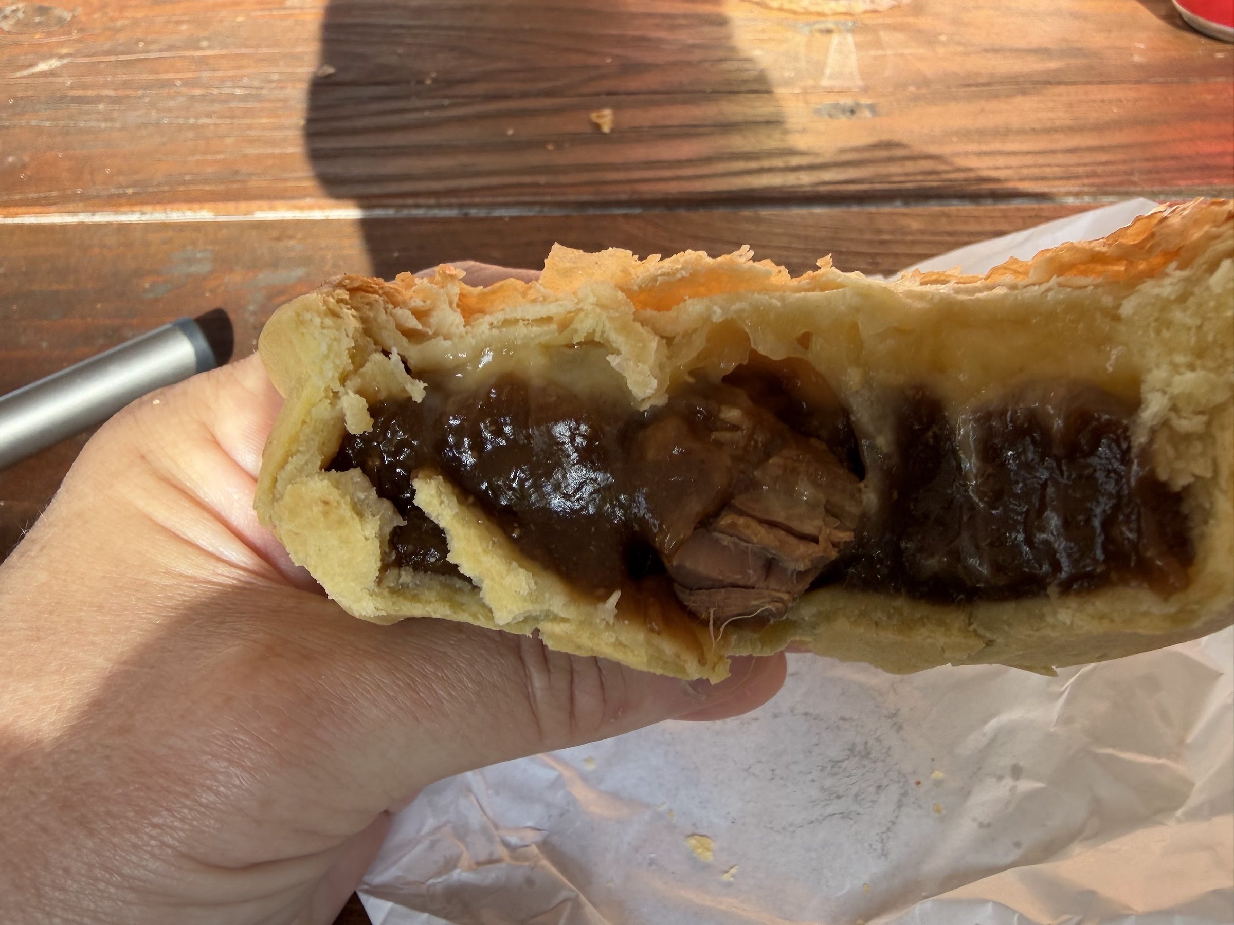 A chunky steak pie broken open